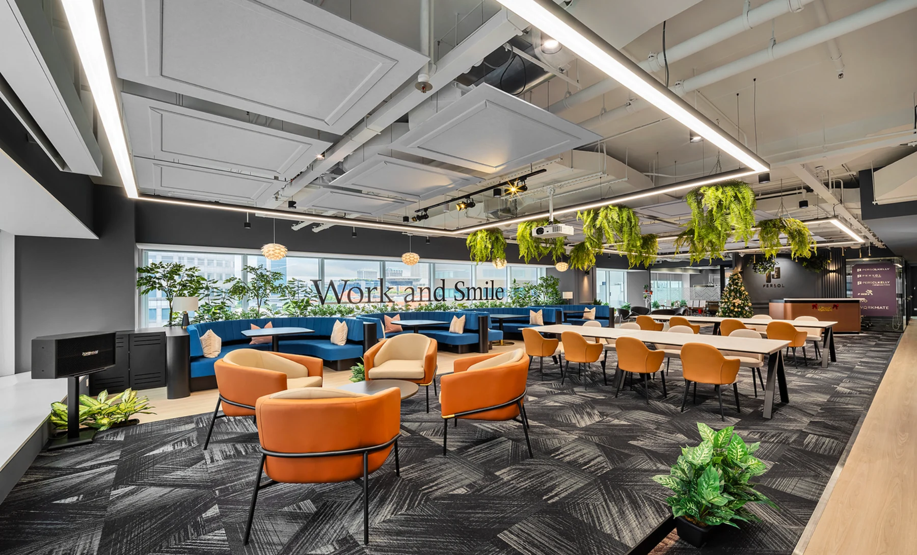 Custom suspended acoustic ceiling panels with coordinated linear lighting and artificial greenery